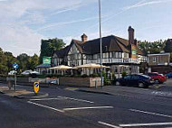 The Bells Of Ouzeley Harvester outside