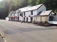 Rock And Fountain Pub And outside