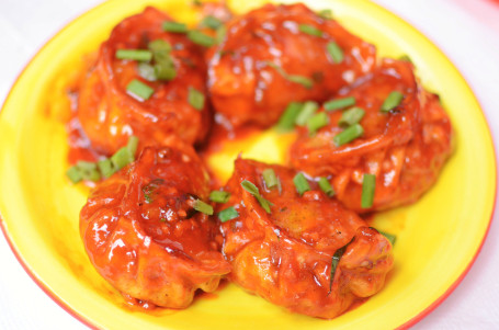 Chicken Pan Fried Momos In Schezwan Sauce (5 Pcs)