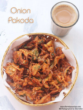 Ginger Milk Tea 500 Ml With Onion Pakora 8 Pcs