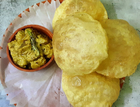 Aloo Posto With Choice Of Luchi/ Radhaballabhi Or Koraisutir Kochuri+ Salad