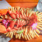 Fire Roasted Lobster On A Bed Of Fries