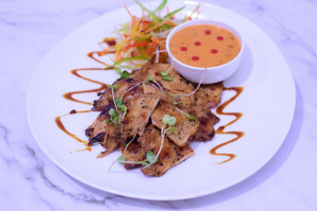 Grilled Chicken Skewers Served With Peanut Sauce