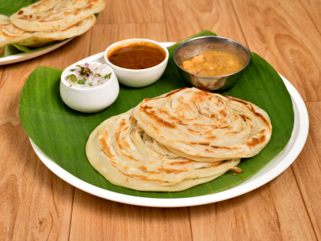 Parotta (1 Pc) Served With Curd And Pickle