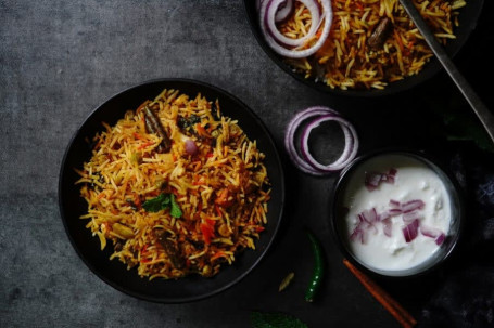 Veg Dum Biryani (Served With Raita)