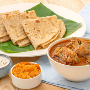 Speciale Ghar Ki Chicken Curry (Met Bot) Met Paratha