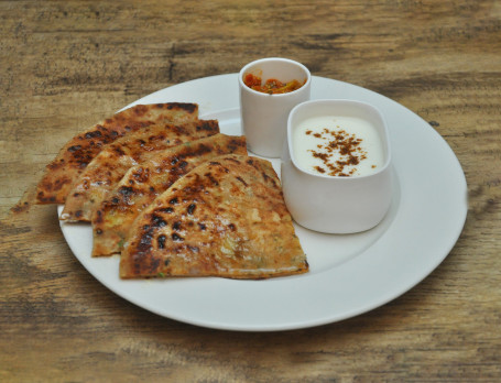 1 Mixed Paratha 1 Paneer Paratha Raita Butter Spicy Sauce.