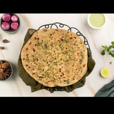 Desi Ghee Aloo Parantha Served With Curd, Chutney And Achaar