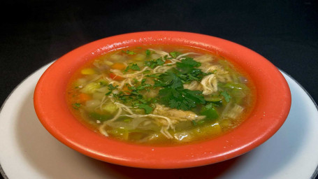 Bowl Of Chicken Broth With Veggies