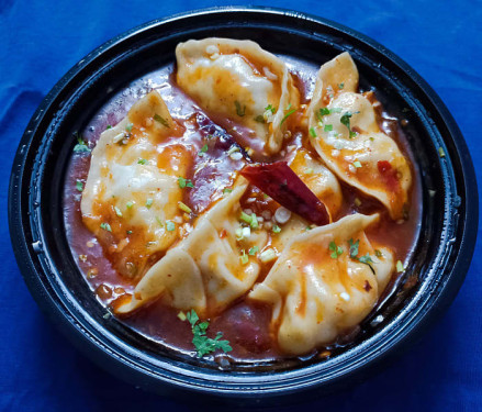 Chicken Dumplings In Hot Garlic Sauce (6 Pieces)