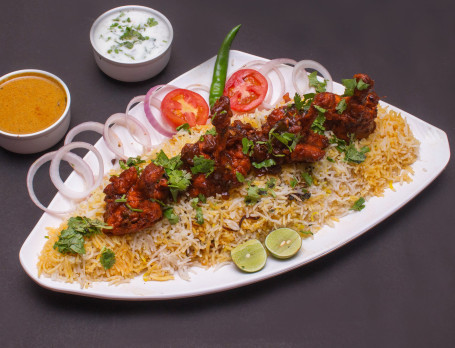 Chicken Lollipop Biryani Served With Raita And Salan (Serves 2)