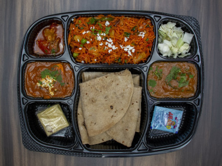 Golden Punjabi Thali (Jain Not Available) (1 Paneer Sabji Or Veg Sabji 4 Butter Roti 1 Special Biryani Salad Achar Sweet Mukhwash)