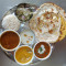 Deluxe Thali (2 Aloo Naan (Small) 1 Missi Roti Chole Kadhi Pakora Rajma Rice Kheer Chutney Pyaaz).