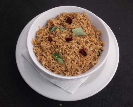 Tamarind Rice Served With Raitha