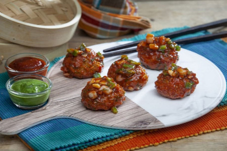 Veg Pan Fried Momos In Schezwan Sauce [6 Pieces]