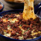 Gesmolten Queso Fundido