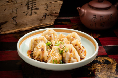 Handmade Dumplings With Mild Chilli Oil (12 Pieces)