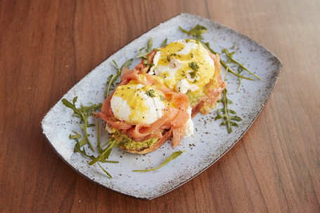 Poached Eggs With Smoked Salmon, Avocado Poached Eggs On A Sourdough Toast With Hollandaise