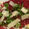 Oxfilé Carpaccio Oxfilé , Parmesan,Pinjenötter Och Ruccola