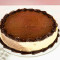 (8-12 Servings) Round All Ice Cream Cake Topped With Fudge.