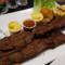 Anticuchos De Corazon Con Papa Dorada